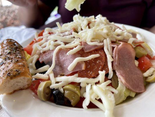 Cobb Salad: Some meats and cheeses, but no Dressing.