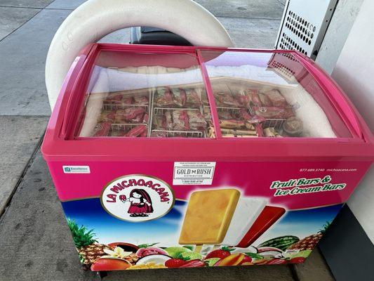 Ice cream fridge right outside mart