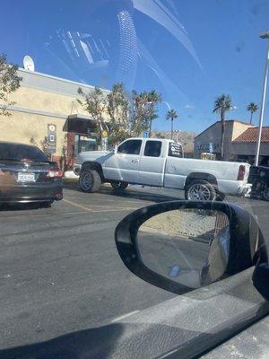 Not a good advertisement for your company when you're driving and parking like an asshole.