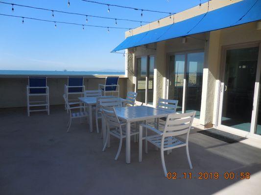 Patio area outside of clubhouse at Huntington Pacific