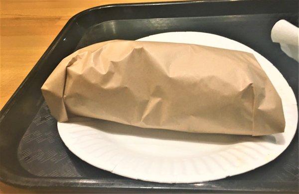 An underwhelming burrito lives under this wrap