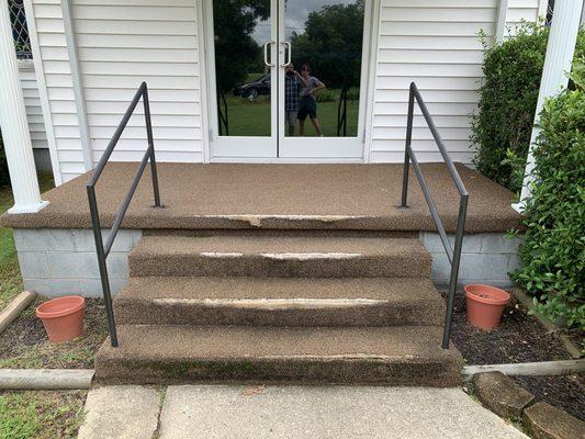 Old, dry rotted carpet on church porch.