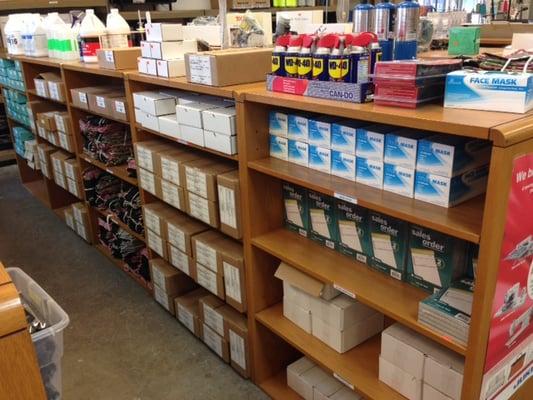 Aisles of sewing supplies for operators and mechanics.