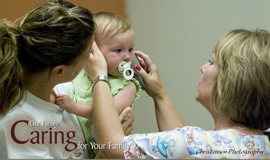 Family Medical Specialties nurse examing a child