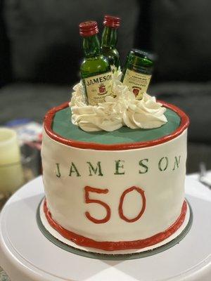 This red velvet cake is infused with Jameson and covered with a buttercream frosting and fondant.