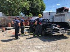 Fire truck training outside of Ash Automotive