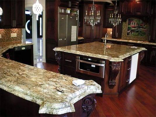 Taupe granite counter top with double ogee edge.