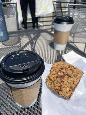 Small coffee and a blueberry oatmeal muffin out on the patio