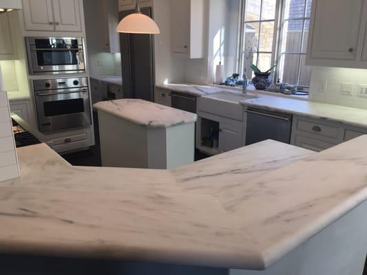 Marble countertops honed , cleaned and sealed.