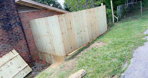 Wood fence installation