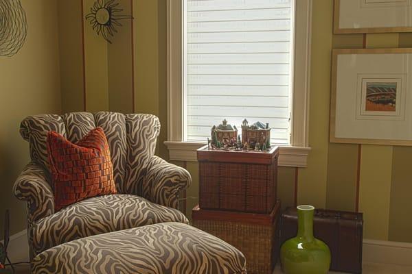 Multi-colored stripes create a nice accent in this bedroom.