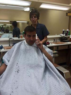 Barber Mark getting a summer cut from Joann