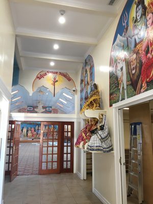 Entry hall to the mandir with a closet on the right for shoes and coats