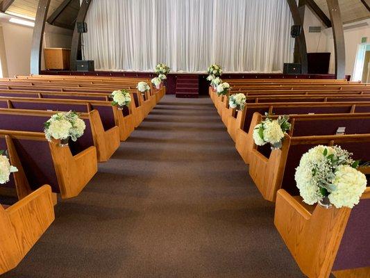 Simple and elegant flowers for the ceremony, which became the reception decor afterward!