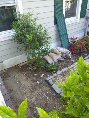 Front yard demo and reconstruction of landscaping.