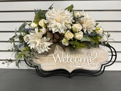 "Welcome" come on in!!  Faux flowers including dahlia and roses in a soft blush with a touch of rustic burlap bow.