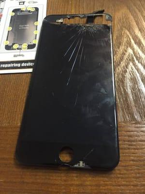 The shattered screen that was taken off of an iPhone 6 Plus.