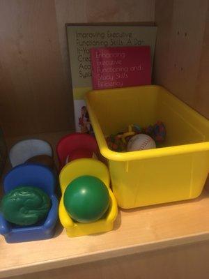 Dr. Heller's hand fidget corner. Squeeze balls and chairs as well as fidget cubes, tanglers, and other similar items.