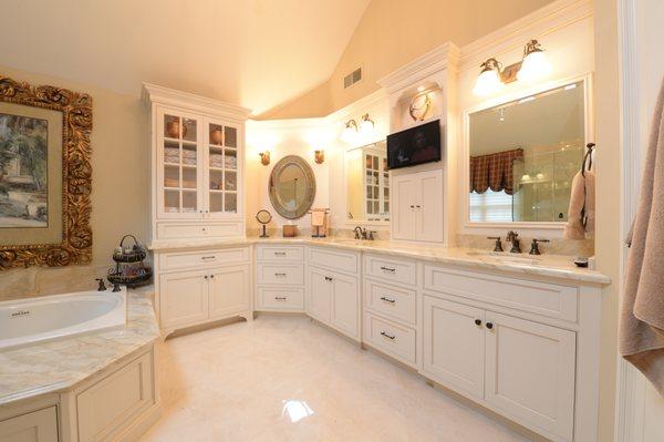 Master Bath renovation. Beaded inset, painted cabinetry with imported marble counter tops.