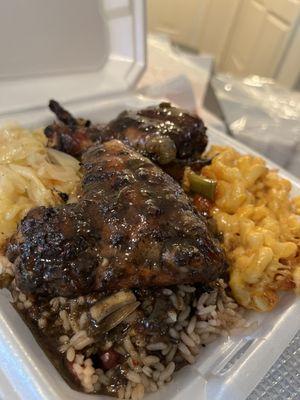 Scrumptious, jerk, chicken, rice and peas, mac & cheese cabbage