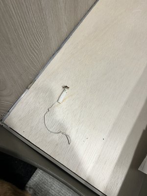 Cigarette butt under the dinette seats