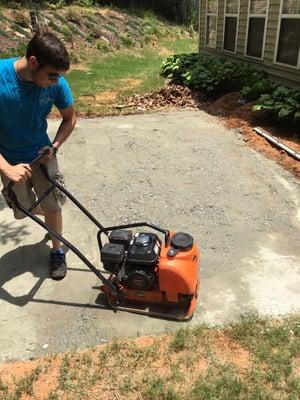 Compacting paver patio base