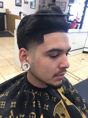 Taper fade with line up At Raul's Barber shop