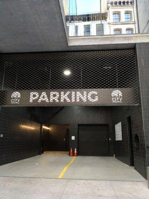 Parking garage beneath luxury condos