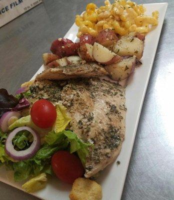 Herb Chicken with baby reds, charcoal chicken mac and cheese, and a salad.