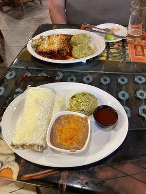 Wet burrito on one plate and enchiladas on the other.  Red sauce was VERY good!