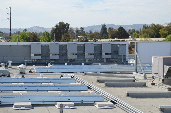 Lehmers Concord GMC, new solar project.  5 Chint inverters seen here installed on roof.