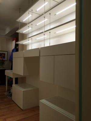 Custom unit w/steel cable, LED lighting, storage and lateral file drawer.