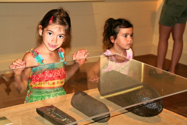 Kids viewing Parrott Cannon shells