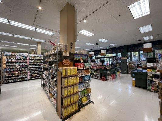 Some baked goods with checkout counters in the back!