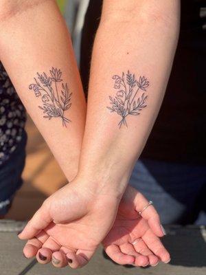 Wild flower tattoos done by Ty At undead ink studios