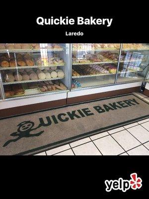 Bakery showcase filled with a good selection of Pan Dulce & cookies.