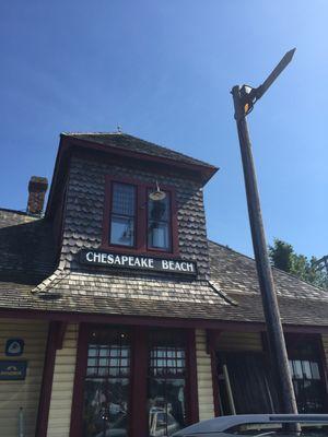 Cedar fish scale shingles, wavy glass windows and wainscoting still adorn this National Historic Landmark.