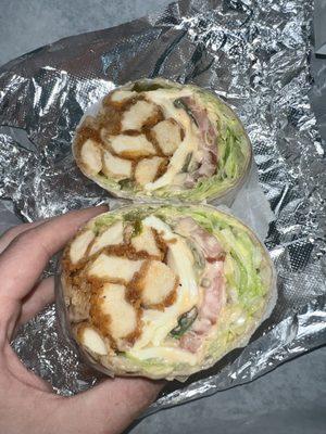 Spicy chicken with mozz lettuce tomato hot peppers and Russian dressing on a wrap