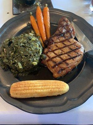 Bone in Pork Chop, collard greens, carrots and corn bread.