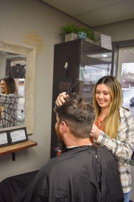 Barber offering Men's Haircuts