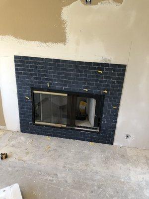 Fireplace tile installation