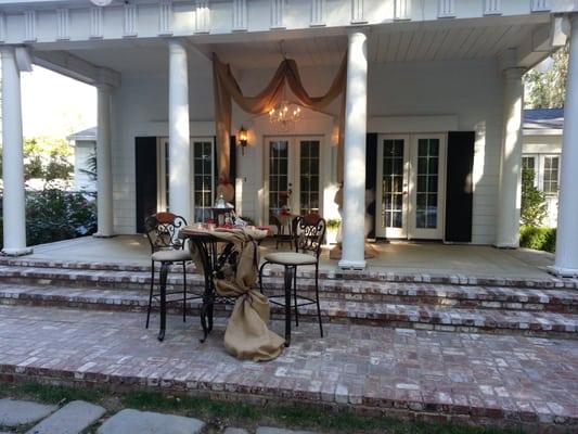 Sweet heart table on our front Portico.