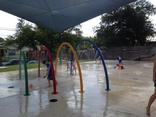 Splash pad, busy summer morning.