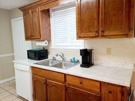 Well equipped Kitchen with cookware, dishware, flatware, bakeware, toaster, mixer, microwave and Keurig w/coffee.