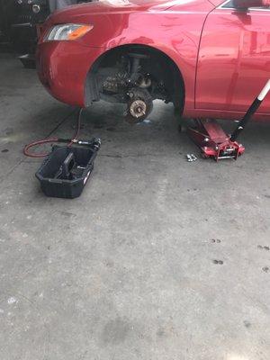 Bought my own brake pads. He was more than happy to resurface my rotors and install pads at a very decent price.