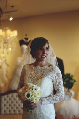 Contemporary bridal bouquet of garden roses and anemonies.