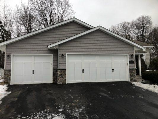 Picture #2 After the doors were installed, it looks like a new home. Great Curb Appeal!