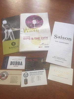 Business cards from the restaurants who offered delicious food at the event.