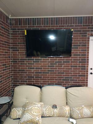 TV install to brick wall