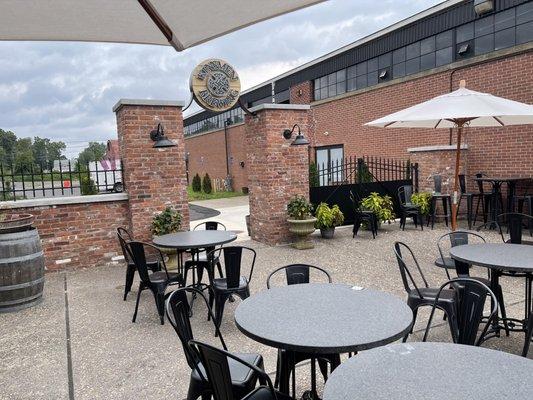 Patio seating in front next to entrance